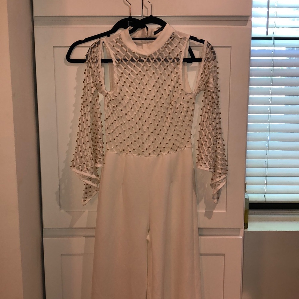 White jumpsuit.